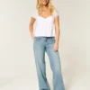 Laag uitgesneden baggy jeans met vlinderprint en medium wassing