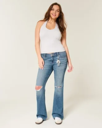 Laag uitgesneden bootcut jeans met scheuren en medium wassing
