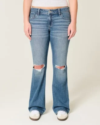 Laag uitgesneden bootcut jeans met scheuren en medium wassing
