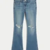 Laag uitgesneden bootcut jeans met scheuren en medium wassing Laag uitgesneden bootcut jeans met scheuren en medium wassing