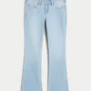 Laag uitgesneden bootcut jeans met sterrenborduursel Laag uitgesneden bootcut jeans met sterrenborduursel