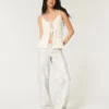 Laag uitgesneden camouflage baggy jeans