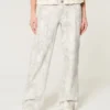 Laag uitgesneden camouflage baggy jeans