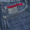 Laag uitgesneden donkerblauwe baggy jort met Amerikaanse vlag