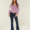 Laag uitgesneden donkerblauwe bootcut jeans Laag uitgesneden donkerblauwe bootcut jeans