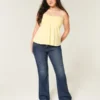 Laag uitgesneden donkerblauwe bootcut jeans