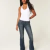 Laag uitgesneden donkerblauwe bootcut jeans met borduursels