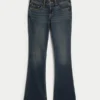 Laag uitgesneden donkerblauwe bootcut jeans met borduursels