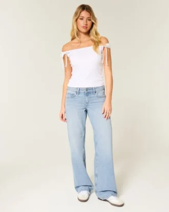 Laag uitgesneden lichtgewassen baggy jeans met studs en strikken