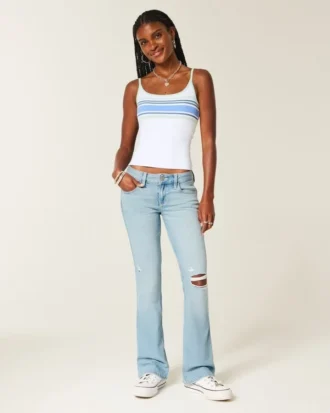 Laag uitgesneden, lichtgewassen bootcut jeans met scheuren en borduursels