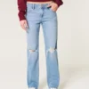 Laag uitgesneden, medium gewassen, relaxte rechte jeans met scheuren Laag uitgesneden, medium gewassen, relaxte rechte jeans met scheuren