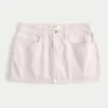 Laag uitgesneden roze denim minirok Laag uitgesneden roze denim minirok