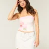 Laag uitgesneden witte denim minirok