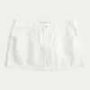 Laag uitgesneden witte denim minirok