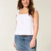 Lage broek met geborduurde denim minirok Lage broek met geborduurde denim minirok