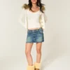 Lage broek met geborduurde denim minirok Lage broek met geborduurde denim minirok