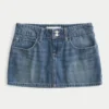 Lage broek met geborduurde denim minirok Lage broek met geborduurde denim minirok