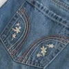 Lage broek met geborduurde denim minirok Lage broek met geborduurde denim minirok