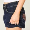 Lage taille donkerblauwe geruite denim minirok met zakken