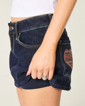Lage taille donkerblauwe geruite denim minirok met zakken