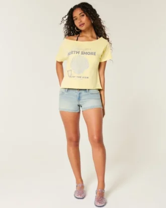 Lage taille, lichtgewassen denim short met bloemenprint en zakken