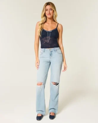 Lage taille, lichtgewassen, losse jeans met scheuren
