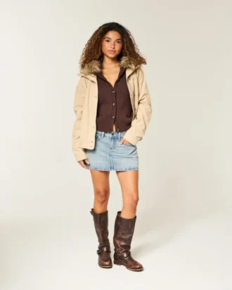 Lage taille, medium wash mini-skort met studs