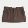 Lage taille mini-rok van imitatiesuède