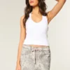 Lage taille roze mini-rok met veters en camouflageprint