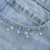 Lichtgewassen denim minirok met studs