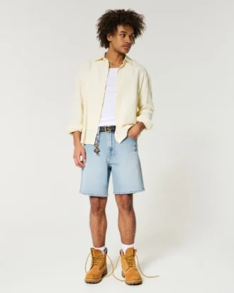 Losse denim short boven de knie met distressed effect