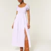 Maxi-jurk met korte mouwen en open rug Maxi-jurk met korte mouwen en open rug