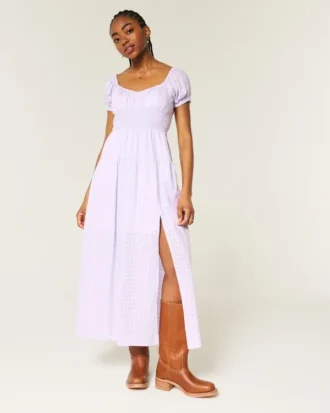 Maxi-jurk met korte mouwen en open rug Maxi-jurk met korte mouwen en open rug