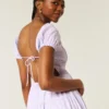 Maxi-jurk met korte mouwen en open rug Maxi-jurk met korte mouwen en open rug