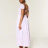 Maxi-jurk met korte mouwen en open rug Maxi-jurk met korte mouwen en open rug