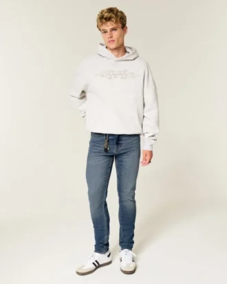Medium wash athletic skinny jeans