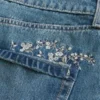 Medium Wash geborduurde denim minirok
