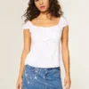 Medium Wash geborduurde ketting denim minirok Medium Wash geborduurde ketting denim minirok