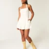 Mini-jurk met halternek en lage taille