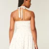 Mini-jurk met halternek en lage taille