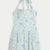 Mini-jurk met halternek en verlaagde taille Mini-jurk met halternek en verlaagde taille