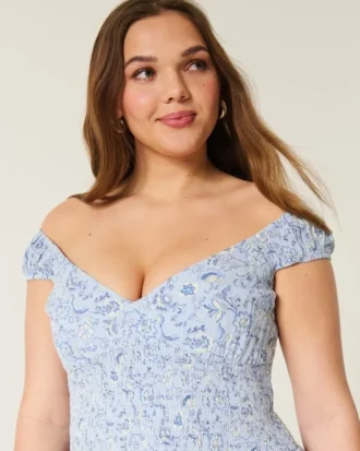 Off-shoulder mini-jurk met asymmetrische zoom