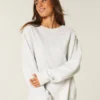 Oversized Class of ’26 Sweatshirt met strik op de rug Oversized Class of ’26 Sweatshirt met strik op de rug