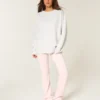 Oversized Class of ’26 Sweatshirt met strik op de rug Oversized Class of ’26 Sweatshirt met strik op de rug