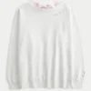 Oversized Class of ’26 Sweatshirt met strik op de rug Oversized Class of ’26 Sweatshirt met strik op de rug