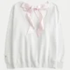 Oversized Class of ’26 Sweatshirt met strik op de rug Oversized Class of ’26 Sweatshirt met strik op de rug