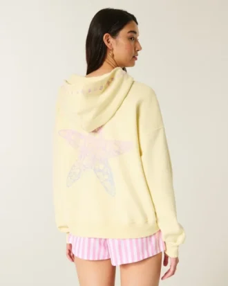 Oversized hoodie met sterrenzeegrafiek en ritssluiting