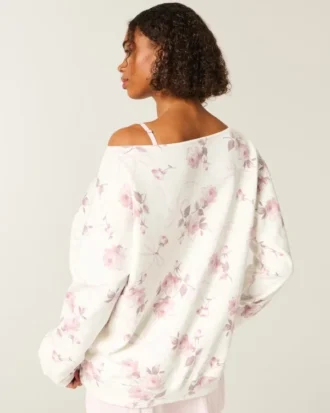 Oversized off-shoulder sweatshirt met bloemenpatroon en strik