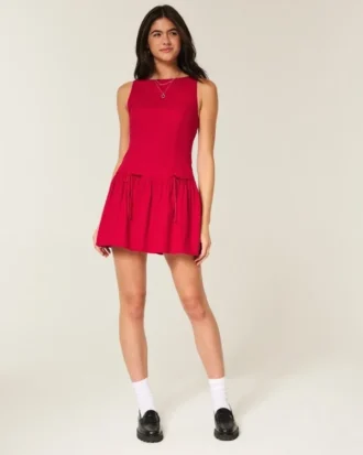 Skortjurk met hoge hals en lage taille