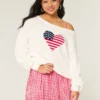 Slouchy off-shoulder trui met hartjesprint Slouchy off-shoulder trui met hartjesprint